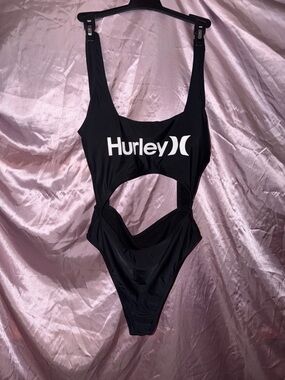 Hurley black one-piece swimsuit with cutouts and white logo graphic